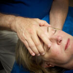 Picture of a person experiencing Cranial/Structural Therapy
